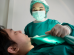 In hospital emergency room doctor use defibrillato.