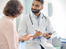 Indian male doctor physician consulting senior pat.