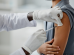 Child vaccination closeup.